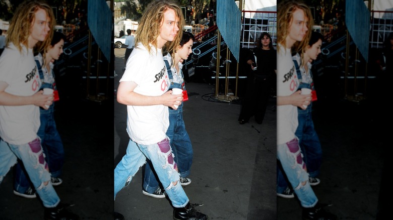 Lead singer of Soul Asylum, Dave Pirner, and Winona Ryder looking casual and walking together at the 1993 MTV Video Music Awards.