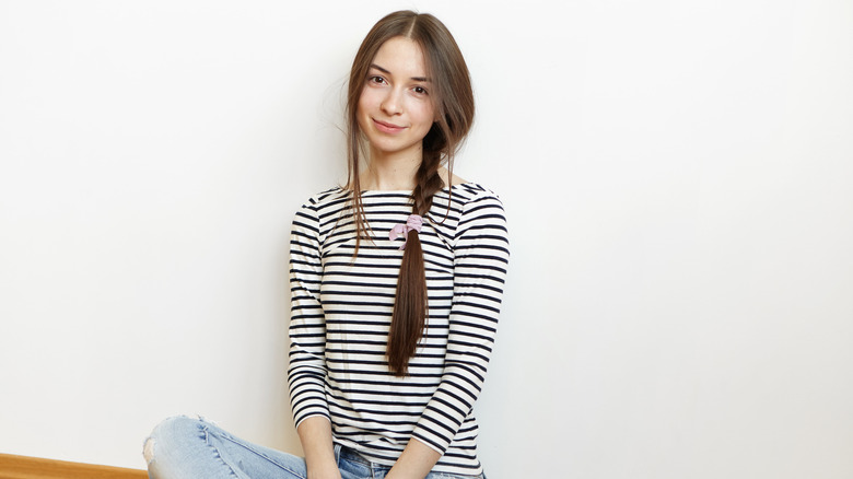 Woman with messy braid