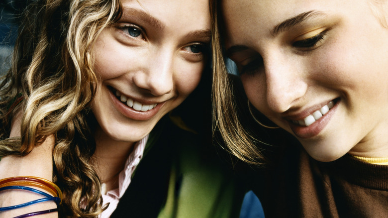 Two girls smiling