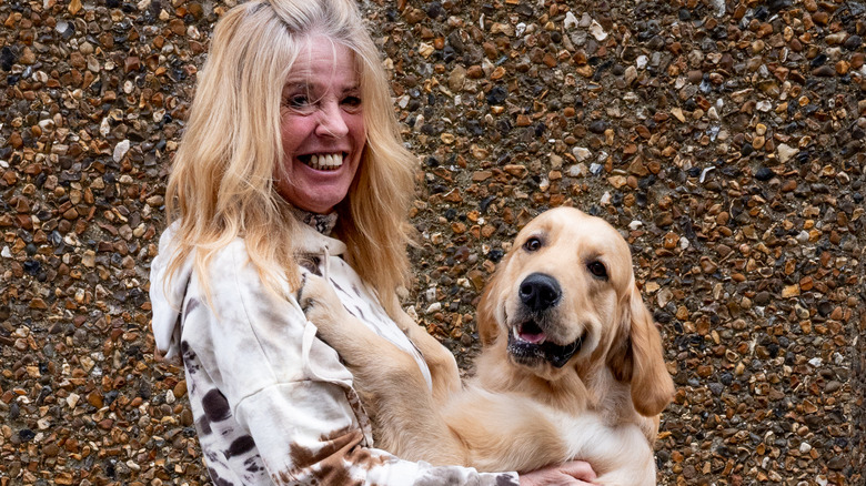 woman with golden retriever