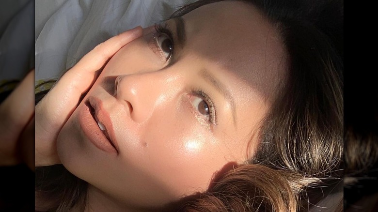 Makeup artist Nam Vo showing off blush look