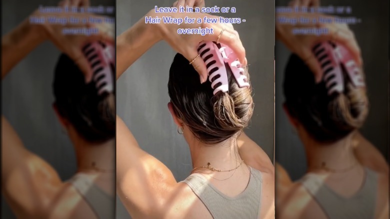 Woman applying hair mask