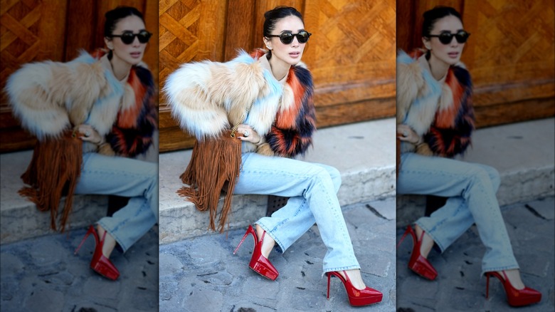Heart Evangelista wearing red heels