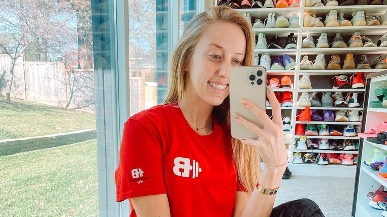 smiling Brittany Mahomes taking selfie