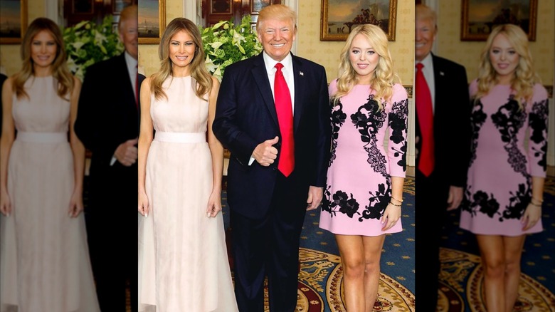 Melania, Donald, and Tiffany Trump posing