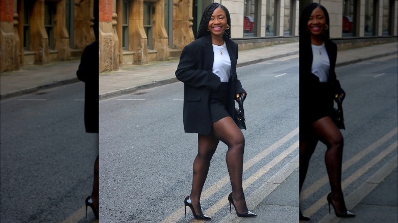 woman wearing a skirt suit