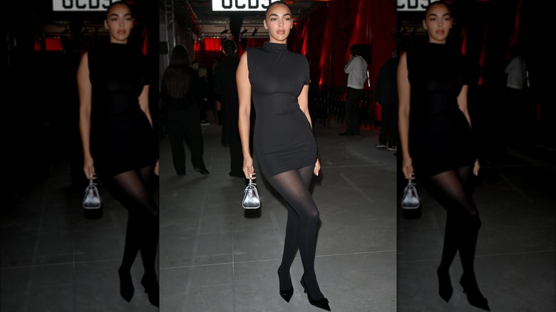 Woman wearing a sheath dress