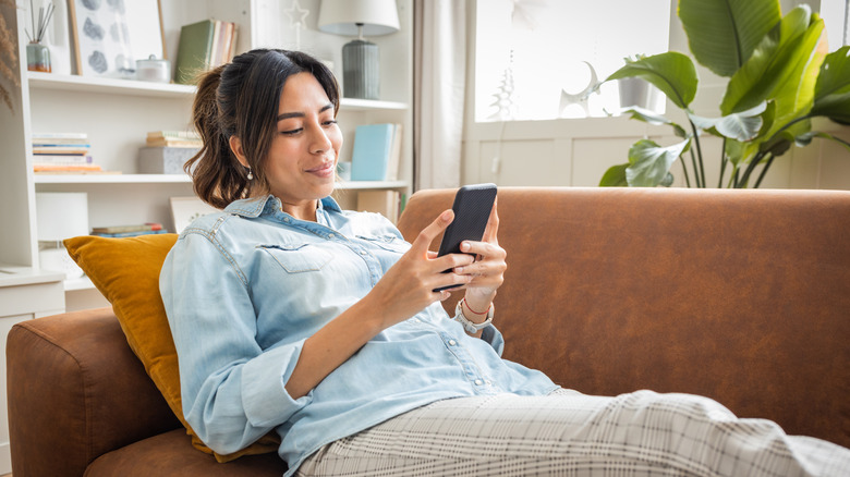 woman looking at phone