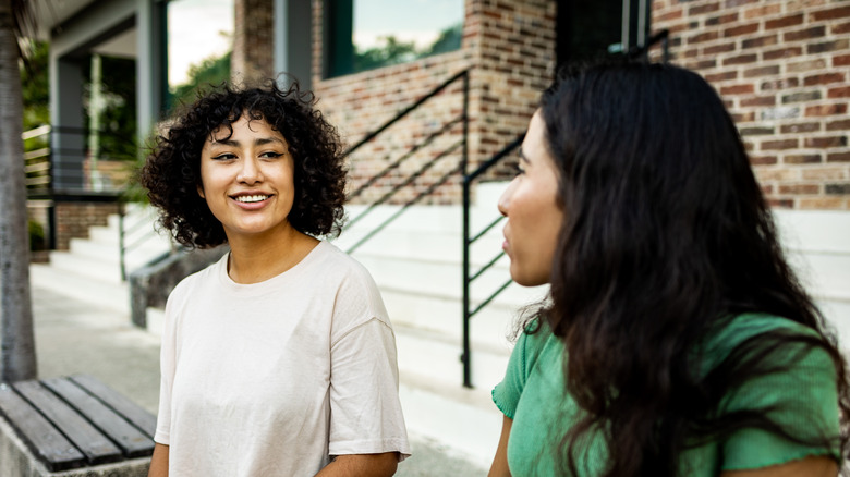 two women talking together