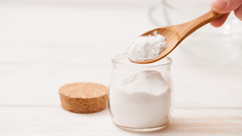 Jar of baking soda with spoon