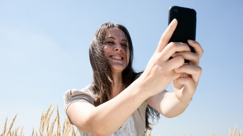 woman filming selfie video