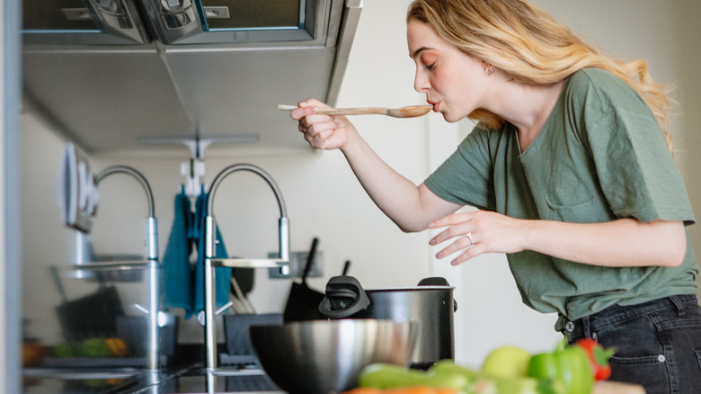 girl tasting her food