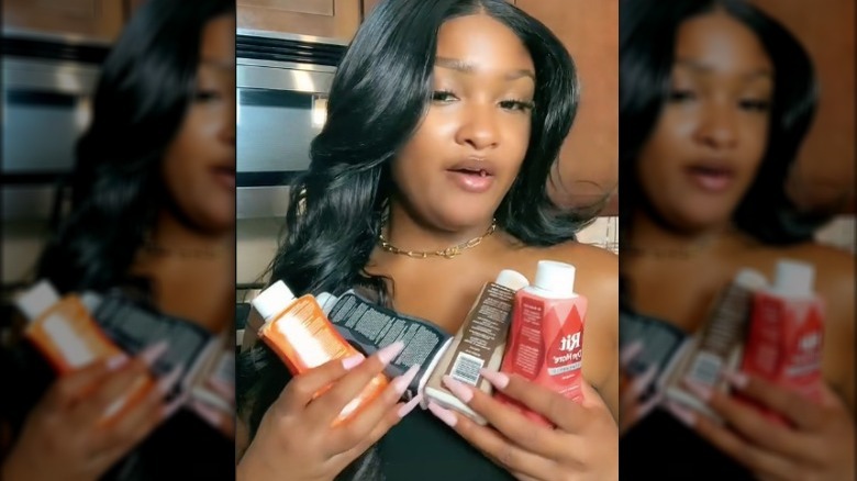 Woman using dye for synthetic hair