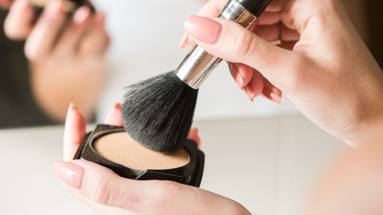 makeup brush in powder 