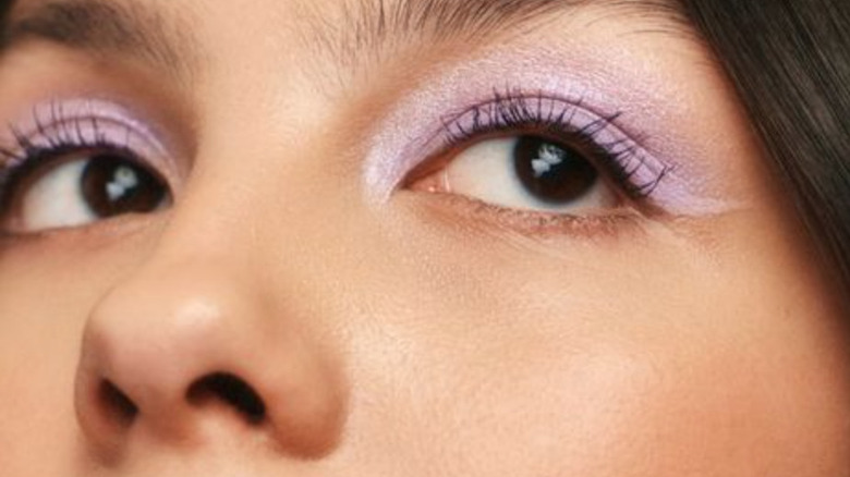 Olivia Rodrigo wearing sheer purple