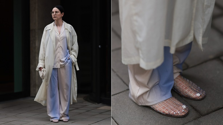A woman wearing a baggy set with jelly mesh shoes