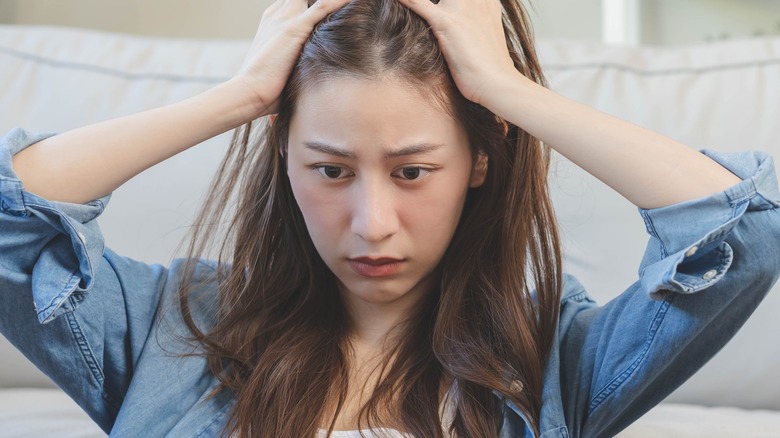 woman stressed about money
