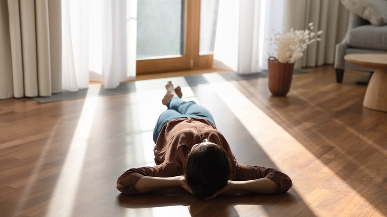 Woman lying on the floor