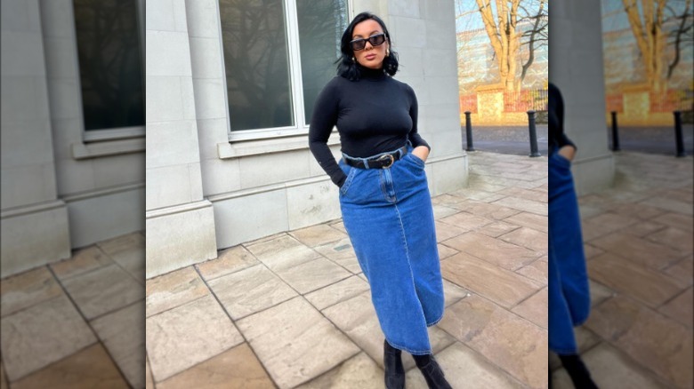 woman wearing denim midi skirt