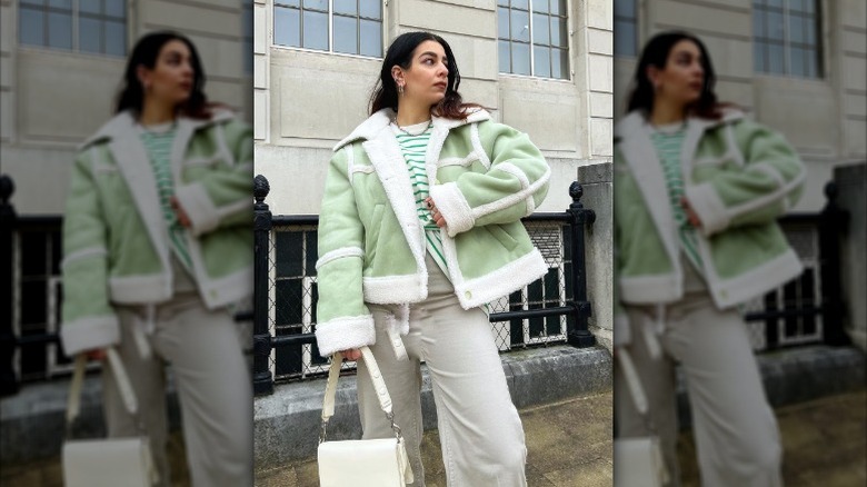 Woman in pastel green jacket