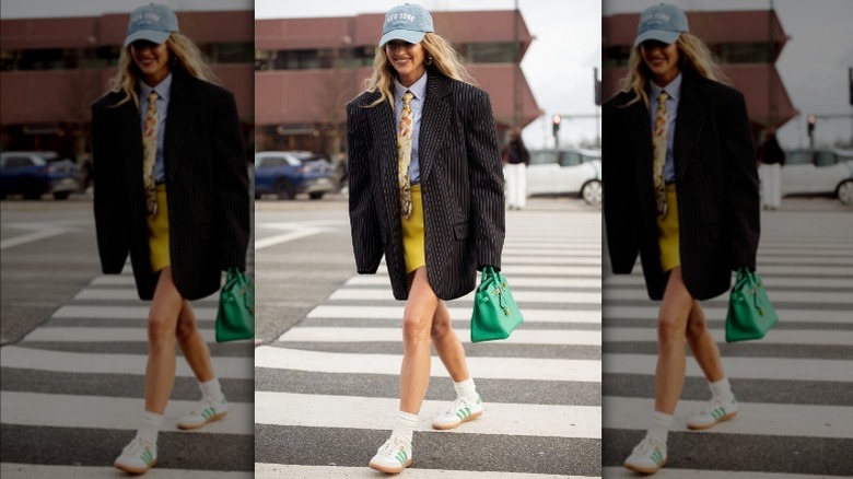 Woman wearing oversized pinstriped blazer