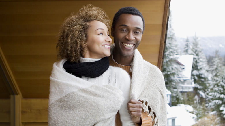 man and woman embracing