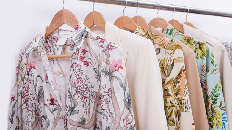 wedding party floral print attire hanging