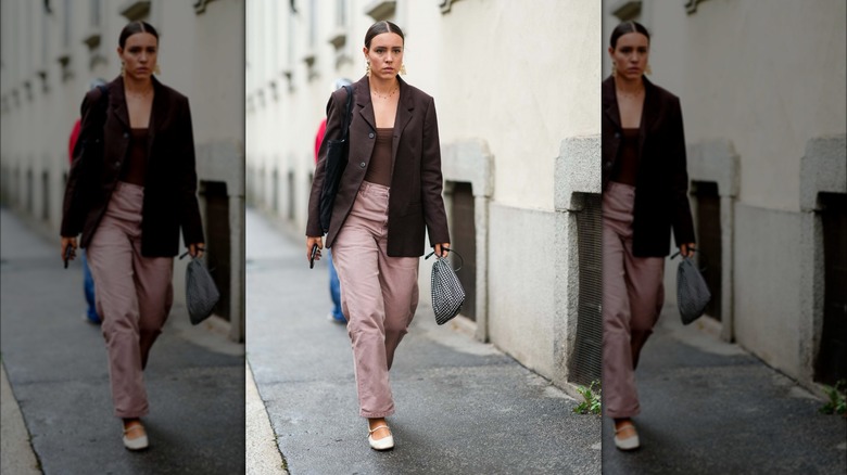 woman wearing white ballet flats