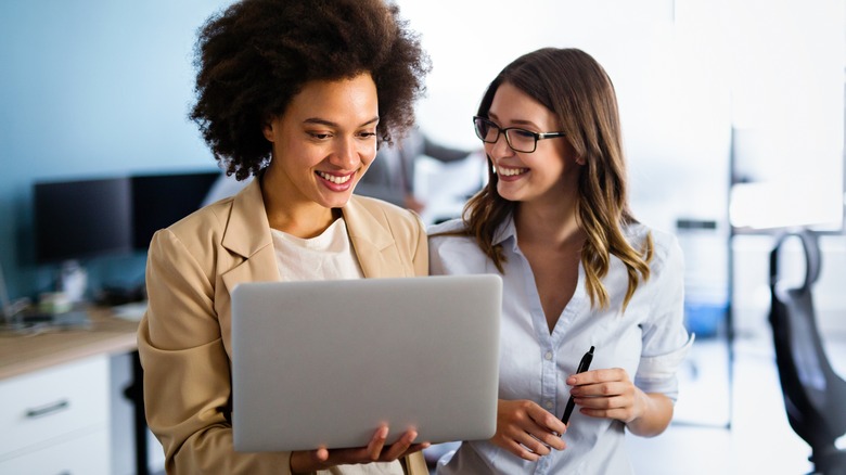 happy coworkers smiling