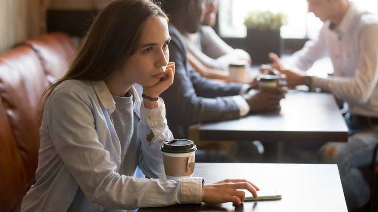 Woman waiting for someone at a cafe