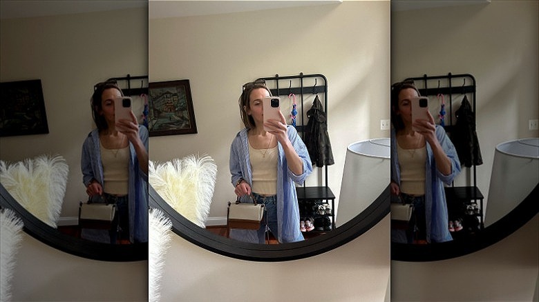 woman wearing button-down over tank