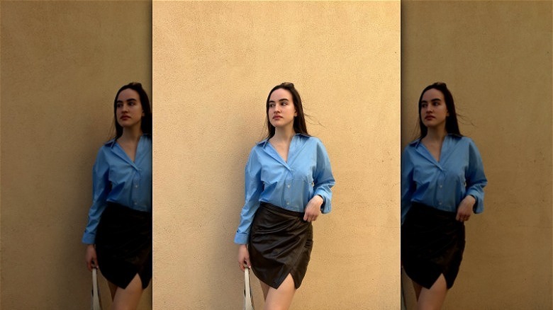 woman wearing button-down with miniskirt