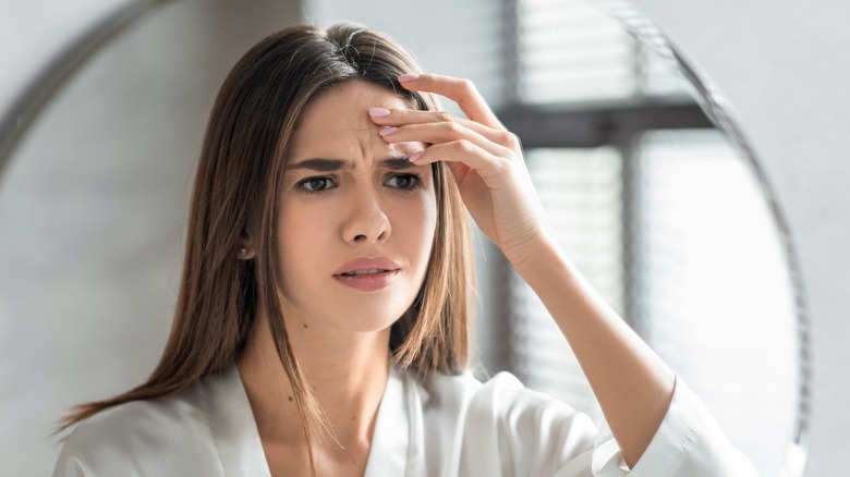 woman worried about wrinkles