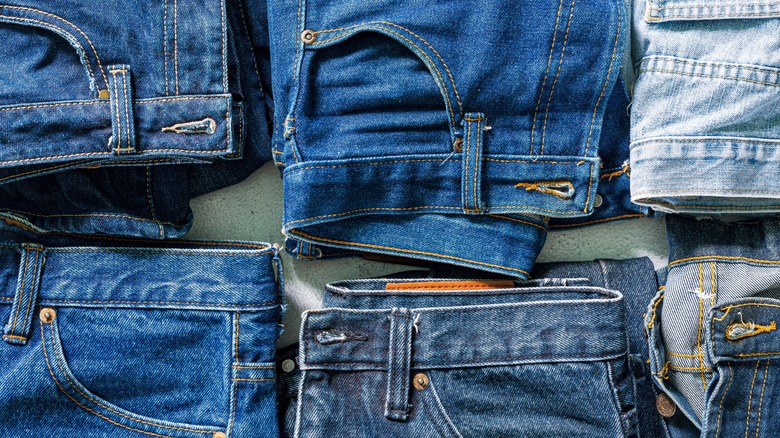 Multiple jeans laying flat