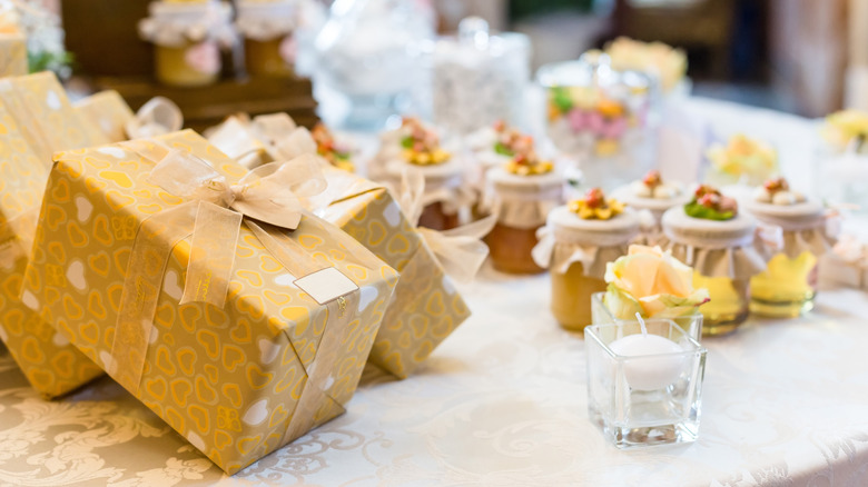 Table full of wedding gifts and favors