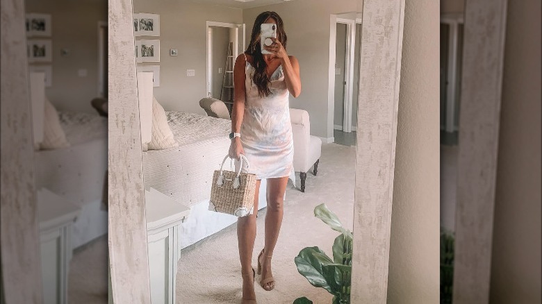 Model wearing slip dress