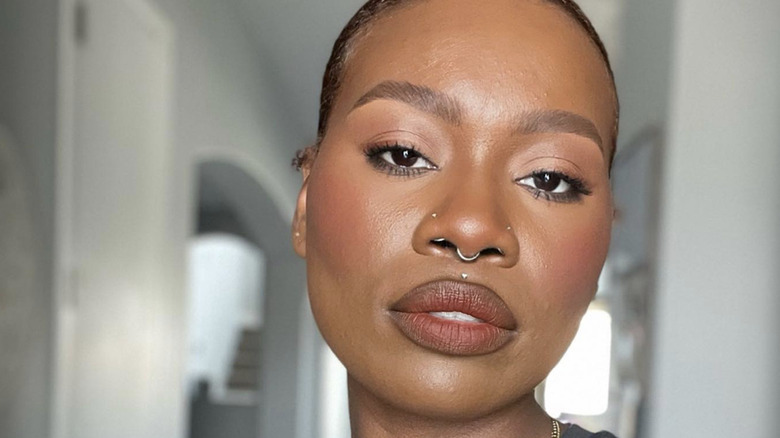 woman in brown matte lipstick