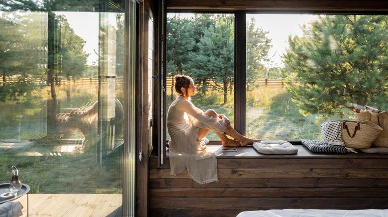 woman on windowsill
