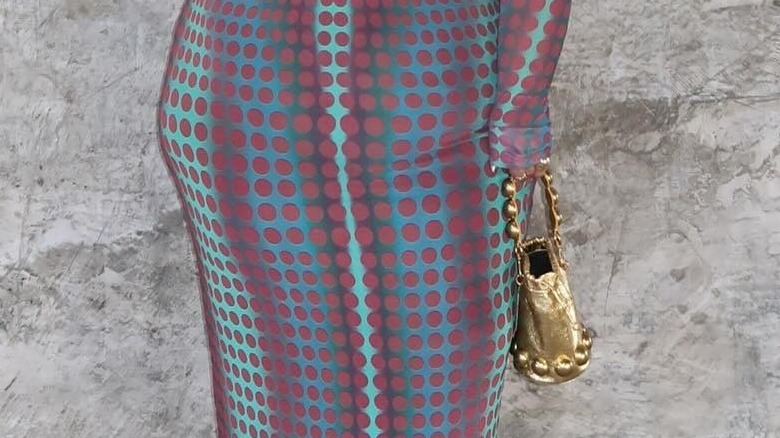 Girl carrying a slouchy top handle