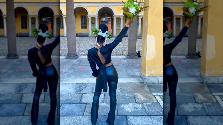 Woman wearing black pants and shirt