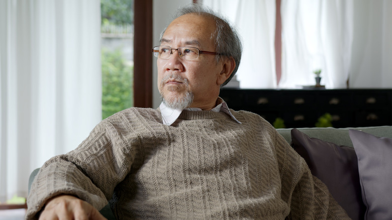 man staring into distance