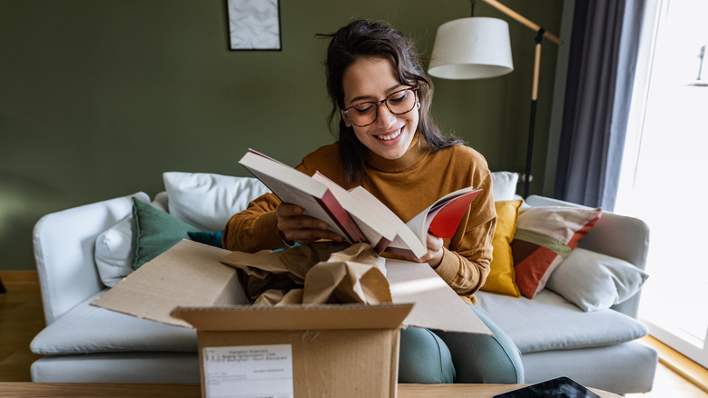 woman holding books