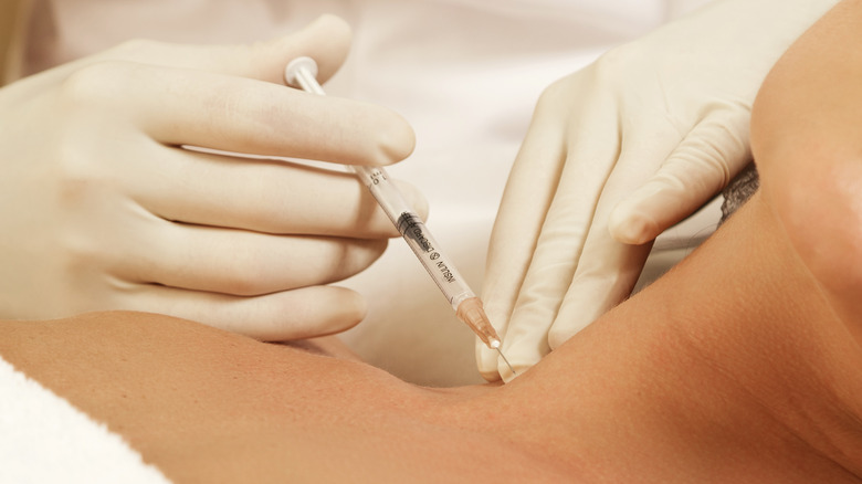 woman getting injection