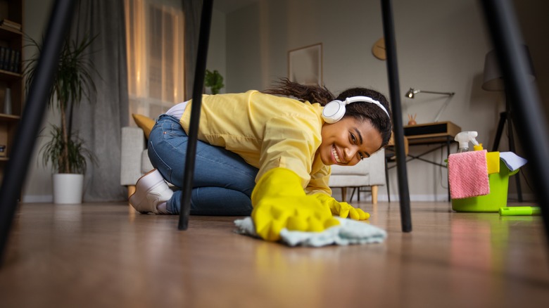 Woman cleaning floor