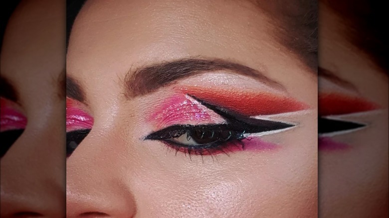 Woman models tri-liner makeup