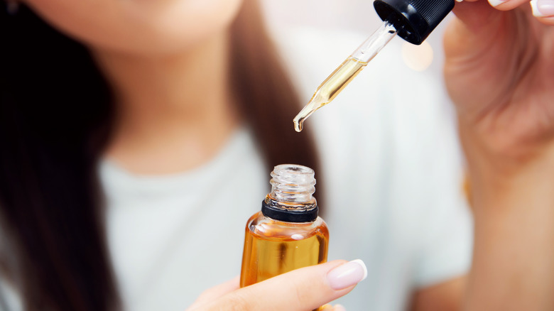 Girl applying mascara
