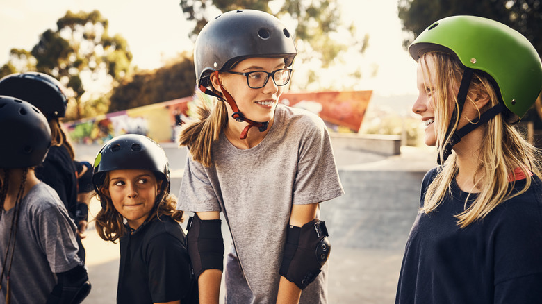 girls talking at skatepark