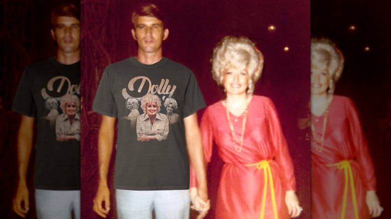 Dolly Parton and Carl Dean Posing together holding hands
