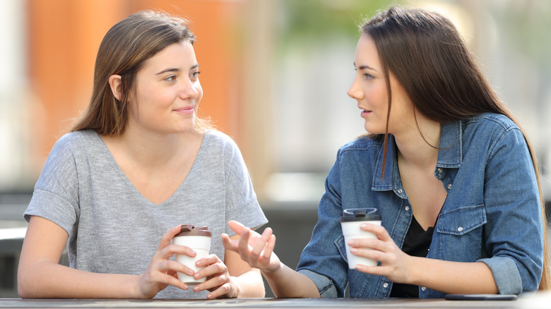 Woman declining drink 