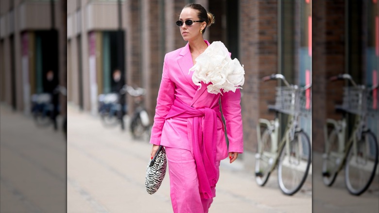woman wearing suit and sweater